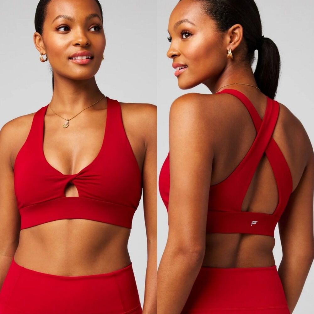 Fabletics Oasis Twist Medium Impact Sports Bra in Holly Berry